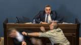 بالفيديو - برلمان جورجيا يتحول لحلبة ملاكمة..