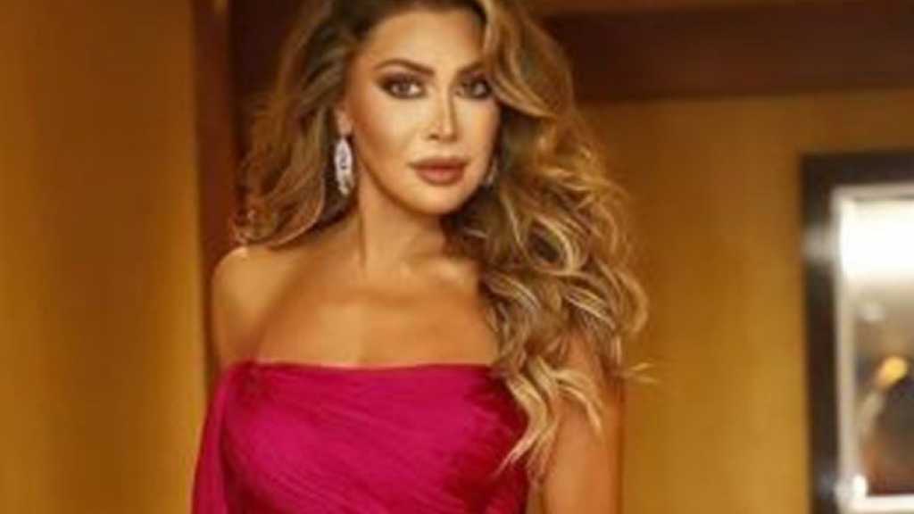 بالصور: نوال الزغبي تخطف الأنظار بإطلالتها الأنيقة في زفاف خاص (فيديو)