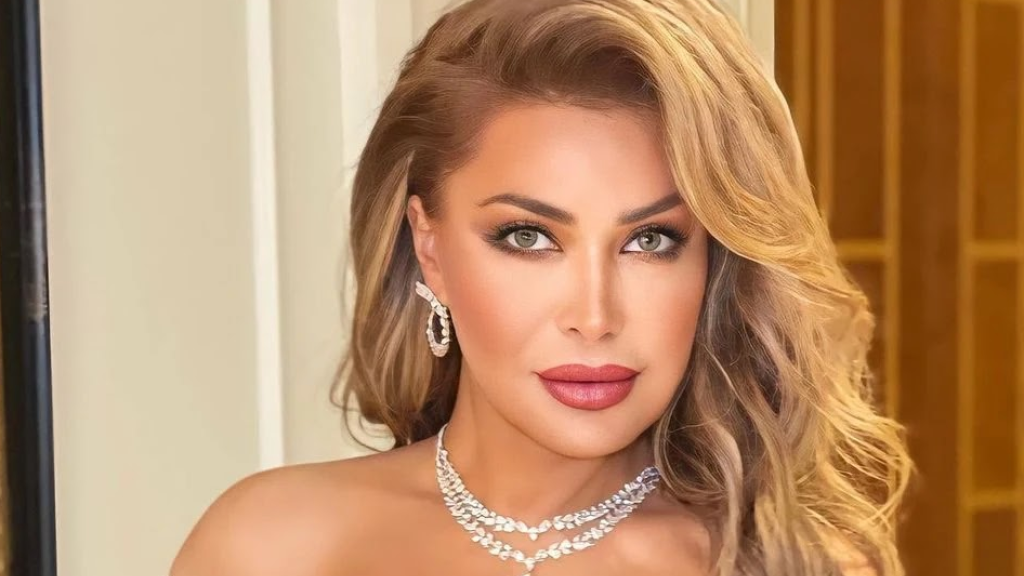 كعادتها.. النجمة الذهبية نوال الزغبي تخطف الأنظار بفستان أبيض جذاب (فيديو وصور) 