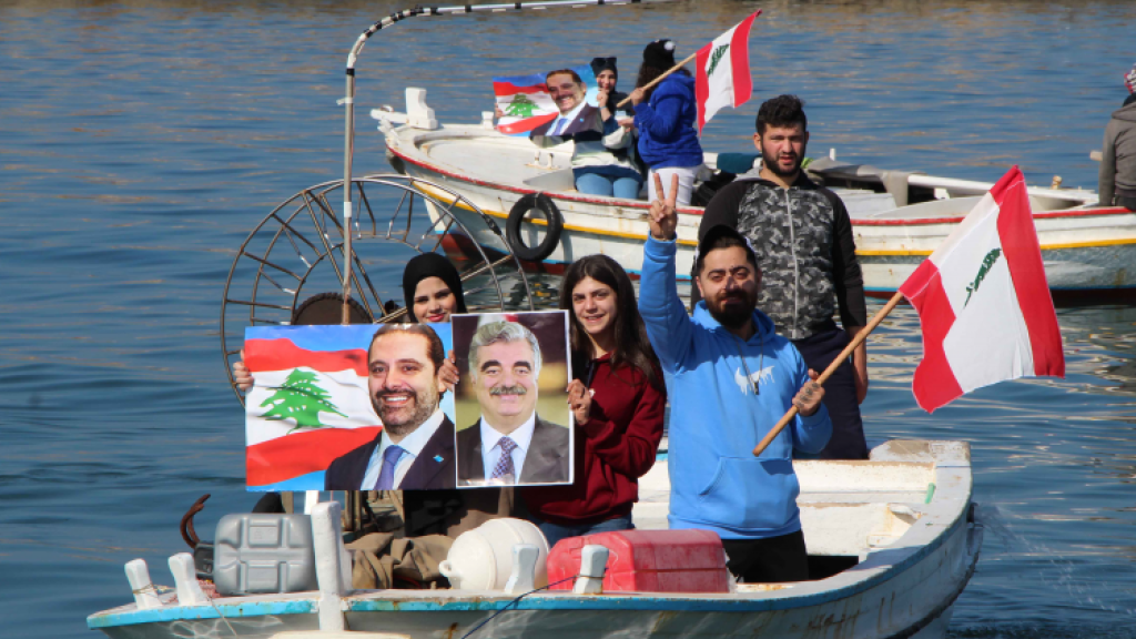 مسيرة مراكب بحرية لصيادي الأسماك في صيدا وفاء للرئيس الشهيد الحريري