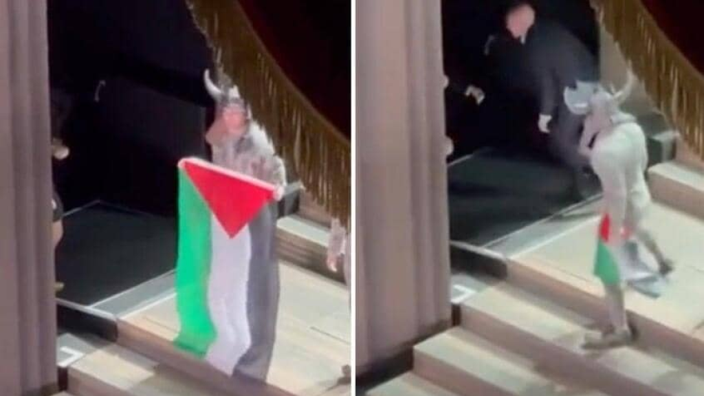 فشلوا في انتزاعه منه.. فنان يرفع علم فلسطين على مسرح دار الأوبرا الملكية في بريطانيا (فيديو)