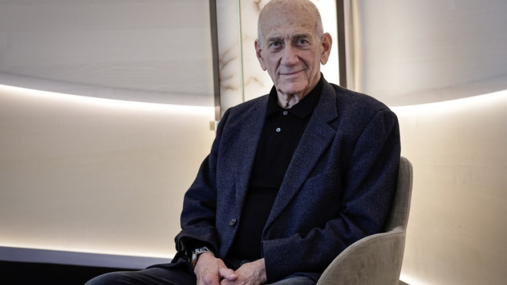 دعوى جنائية تطالب ألمانيا باعتقال أولمرت لارتكابه جرائم حرب بغزة