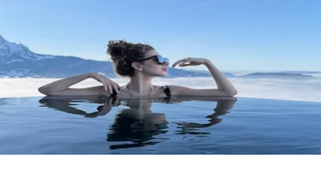 ميريام فارس تخطف الأنفاس: استرخاء ملكي في حوض سباحة بين جبال الصقيع! (صور)